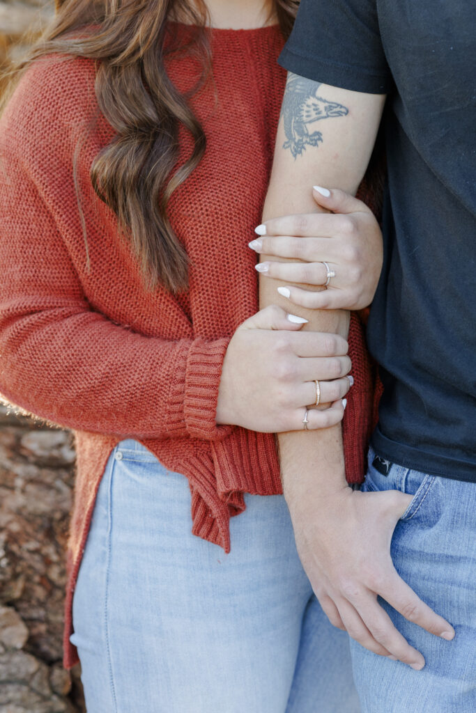 close up of engagement ring of a couple in Montana