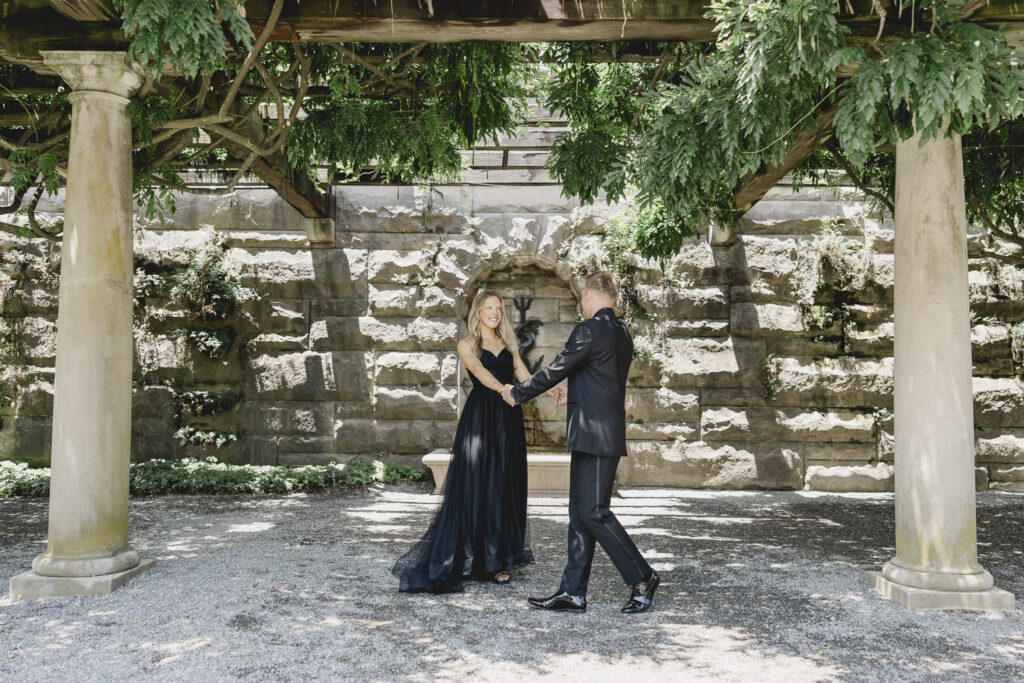 Black tie Engagement photo session at the Biltmore with black tulle dress and black tux with bowtie